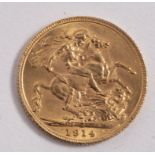 A George V gold sovereign,