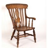 A beech and elm open armchair with splat back and dished elm seat on turned legs