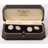 A pair of pearl and mother-of-pearl cufflinks of octagonal form set in gold