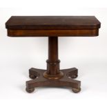 A Regency rosewood card table on column support,