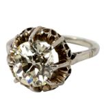 A solitaire diamond ring, the cushion shaped stone claw set to a white precious metal shank,