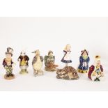 A collection of eight Beswick Alice Series figures, including Cheshire Cat, Gryphon, Mock Turtle,