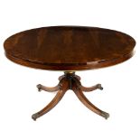 A George IV rosewood and crossbanded circular breakfast table on quadruped base,