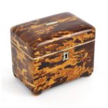 A Regency tortoiseshell tea caddy of rectangular form on bun feet, 12.