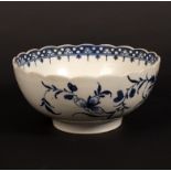 A Worcester bowl decorated in the three flower pattern, circa 1775, with crescent mark, 15.