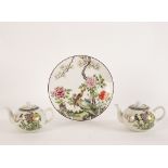 A pair of Chinese porcelain teapots, 20th Century, decorated birds, flowers and script,