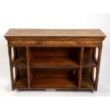 An early 20th Century olive wood hanging shelf with moulded cornice and fluted divisions,