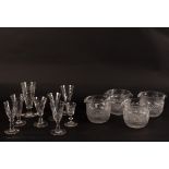 A set of four wine rinsers with step and diamond cutting and a group of assorted drinking glasses