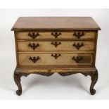 A Gillow chest of three drawers on carved cabriole legs, 91.