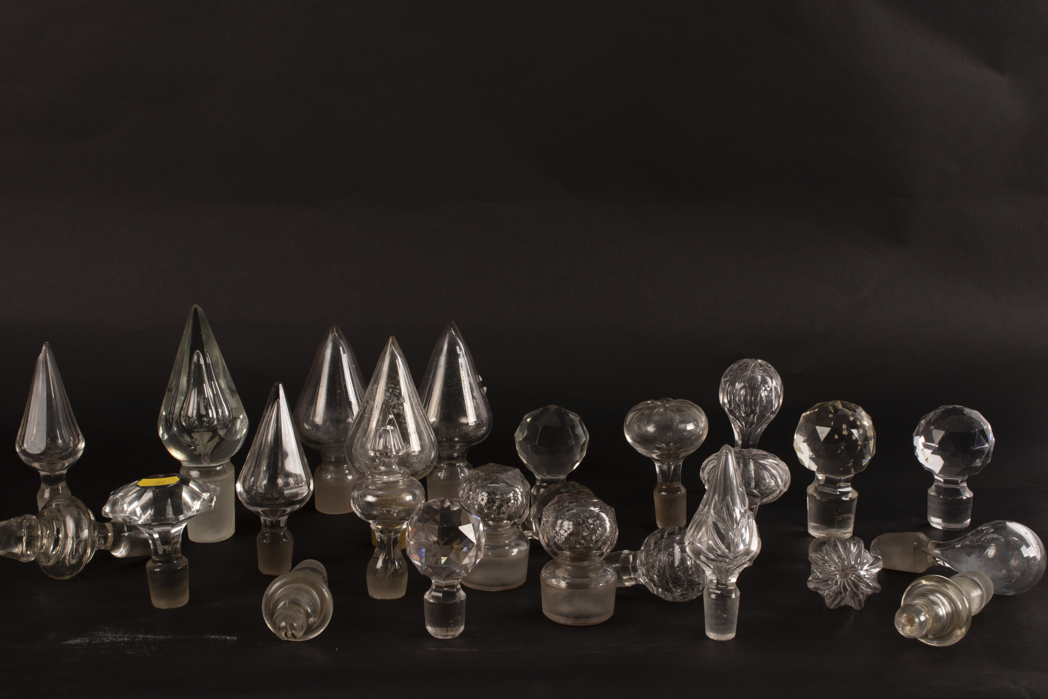 A quantity of decanter and scent bottle stoppers,