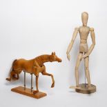 An artist's dummy and another of horse form