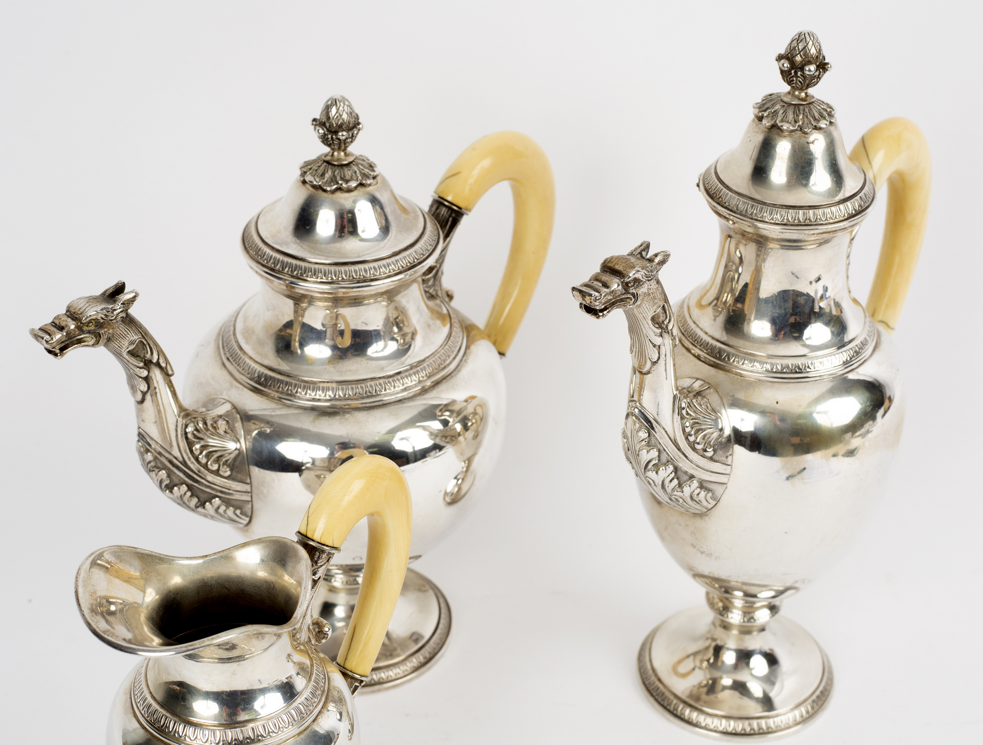 An Italian silver coffee set, circa 1925, comprising a lidded coffee pot, water jug,