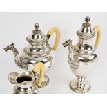 An Italian silver coffee set, circa 1925, comprising a lidded coffee pot, water jug,