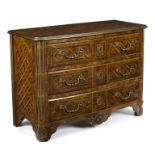 An Italian kingwood commode with ormolu mounts and handles, fitted three drawers on bracket feet,
