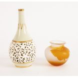 A Graingers and Company pear shaped vase with reticulated decoration,