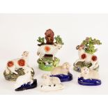 A pair of Ralph Salt pearlware ram and ewe figures,