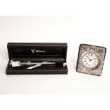 A Quartz clock in a silver fronted easel back case and a Russian ballpoint pen with black diamond
