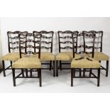 Six mahogany pierced ladder-back dining chairs of 18th Century style,