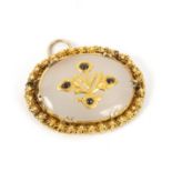 A Mughal gem set oval pendant,