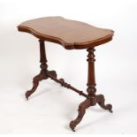 A Victorian walnut centre table, the top of serpentine outline,