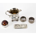 A Victorian silver Christening mug, JE London 1844, altered as a jug (1876) two napkins rings,