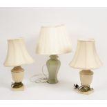 A pair of vase shaped pottery table lights and another