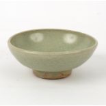 A Chinese celadon bowl, Yuan dynasty, with crackle glaze,