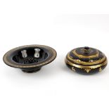 An Oriental black and gold lacquer circular bowl and cover decorated Dogs of Fo,