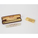 A Dunhill gold plated lighter and a boxed Yard-O-Led rolled gold propelling pencil with original