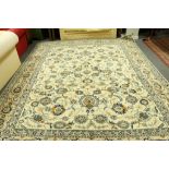 A Nain carpet, the foliate field to a cream ground within a pale camel multiple border,