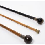 A lady's walking stick with hardstone knop,