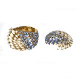 Schauer, Fifth Avenue, a brooch and bangle set,