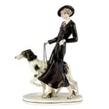 Katzhutte, an Art Deco figure group, modelled as an elegant lady walking her Borzoi hound,