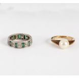 A cultured pearl ring set in 9ct yellow gold, size L and a paste set eternity ring in 9ct gold,