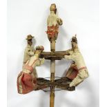 Folk Art, a painted, carved wood, textile and wire figurative dancing prop,