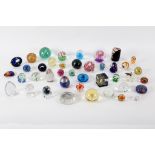 A collection of modern glass paperweights,