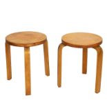 Alvar Aalto, two circular beech wood stools,