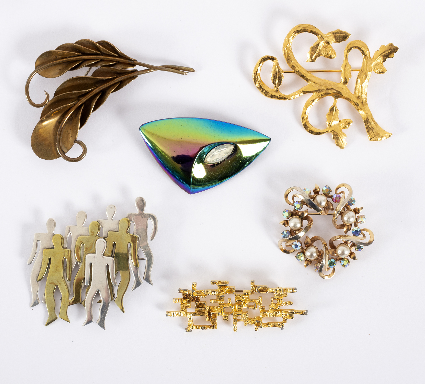 A bronze modernist brooch in the form of leaf sprays,
