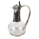 Guild of Handicraft, an Arts & Crafts style silver mounted claret jug, London 1996,