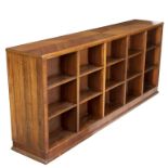 A large double-sided padauk bookcase attributed to Whytock and Ried,