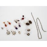 Various pairs of drop earrings including silver starburst, pine cone forms etc.
