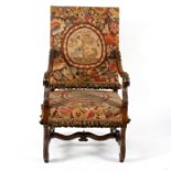 A Franco-Flemish high back open armchair, 17th Century style, rectangular back and stuffover seat,