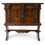 An Italian walnut cupboard on stand, drawers to frieze, early 18th Century,