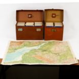 A quantity of Bartholomew's ½" maps contained in two leather cases,