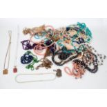 A quantity of costume jewellery including pearl necklaces