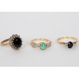 A sapphire and diamond three-stone ring,