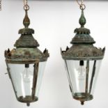 A pair of copper lanterns with crown tops and bowfront glass panels, 96.