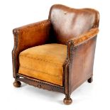 A child's upholstered leather chair
