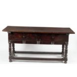 A Spanish stained walnut serving table, early 17th Century,