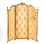 An Edwardian three-panel, two-fold screen with ribbon tie finial,